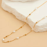 Pearl and bead station necklace