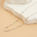 Pearl and bead station necklace