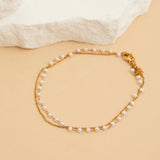 Double row pearl and gold anklet
