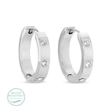 Contemporary huggies w/3 single cubic zirconia