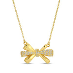 Gold bow with pave accents necklace