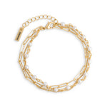 Pearls from within gold bracelet